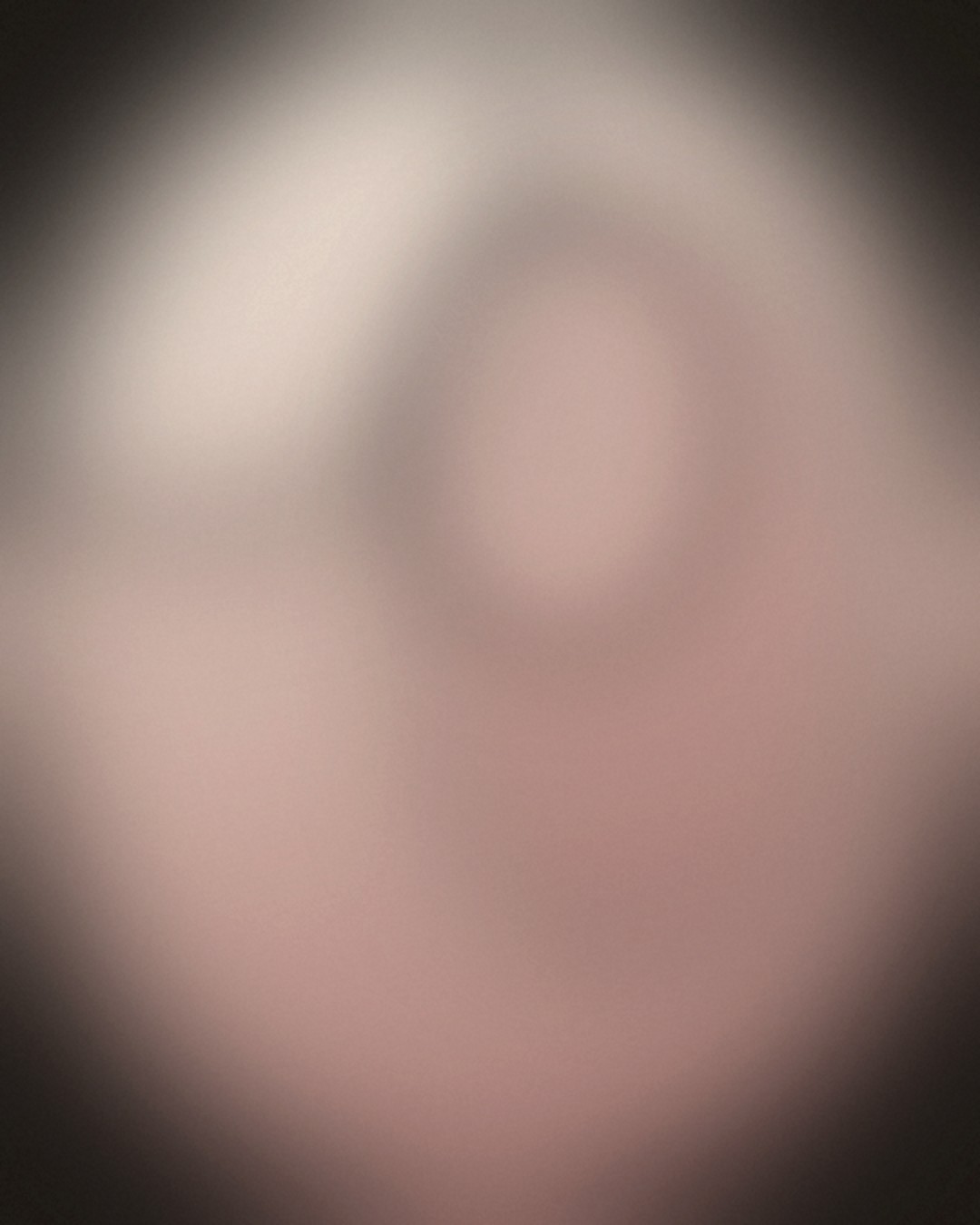 Abstract portrait plate with a pale profile of light