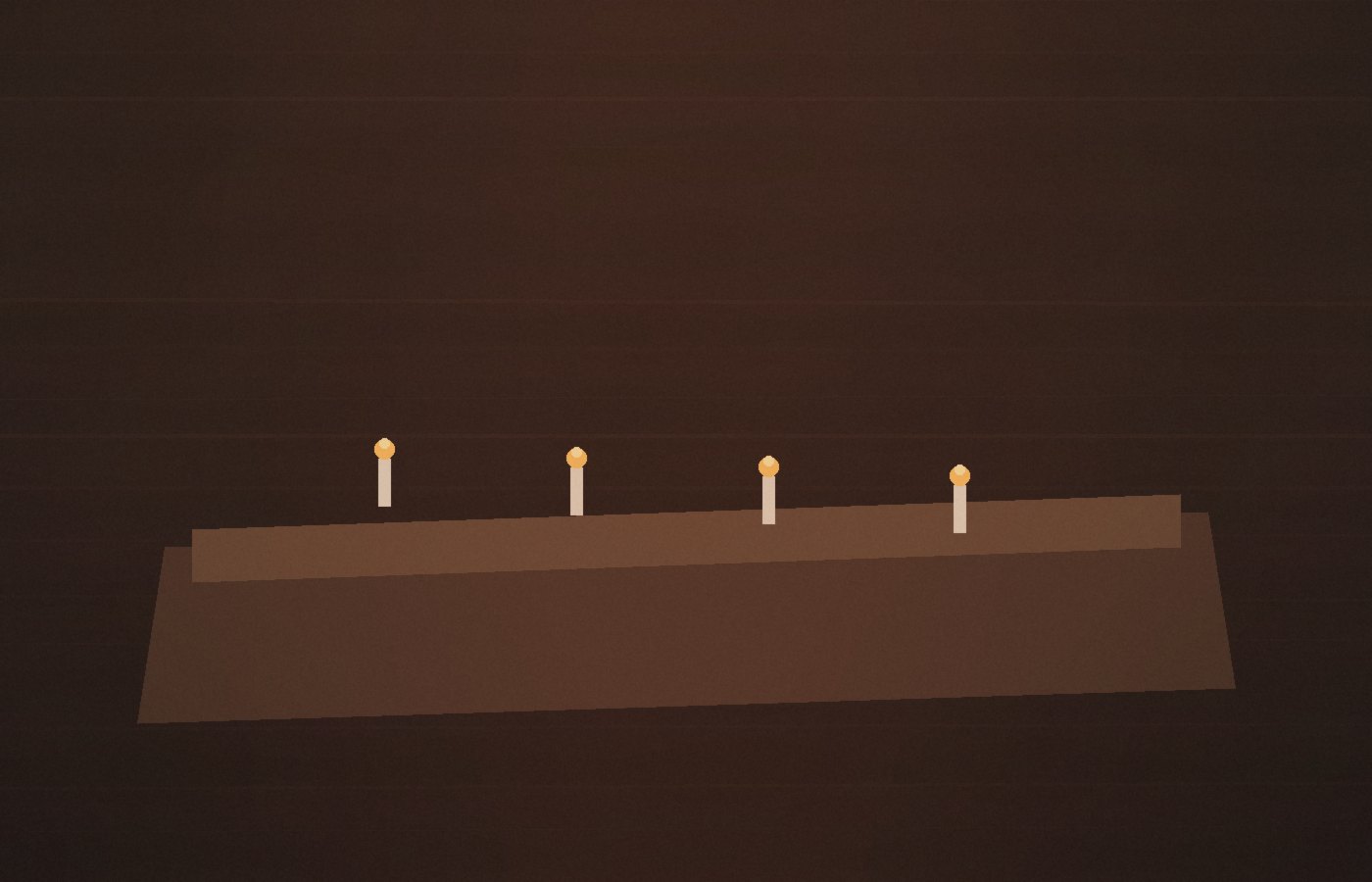 Long wood table with candlelight in a dark dining room